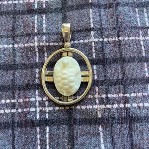 Carved mammoth turtle pendant